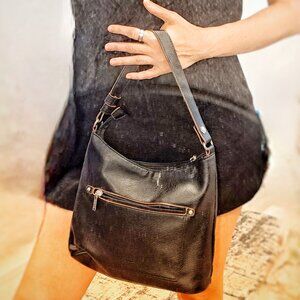 Roots black shoulder purse